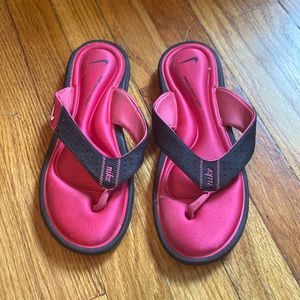 Nike size 8 pink and black sandals with cushion.